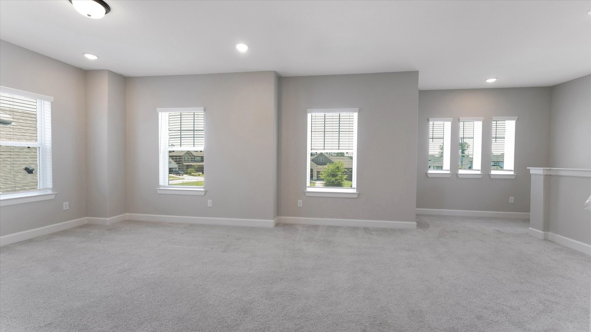 15607 Rising Wren Court Conroe, TX 77302 - Photo 26 of 40 an empty room with windows