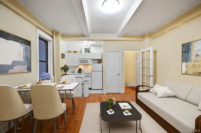 a living room with furniture and a table