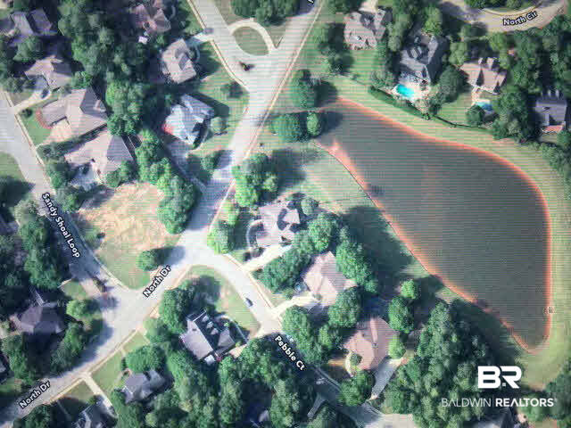 100 Sandy Shoal Loop Fairhope, AL 36532 - Photo 4 of 13 This aerial picture of Lot 429 reflects the view of the lake on the opposite side of North Drive. Since Lot 429 is about 15 above this lake, there is a very good view of this lake for this lot.