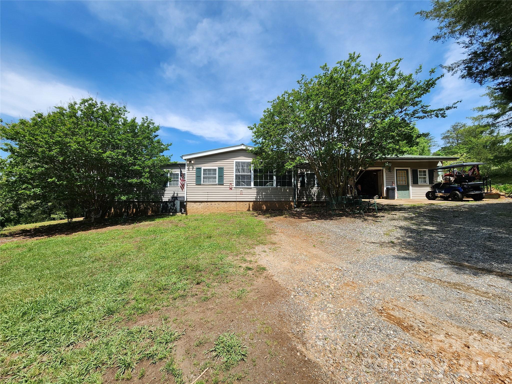130 Susan Road Casar, NC 28020 - Photo 1 of 14 a house view with a garden space