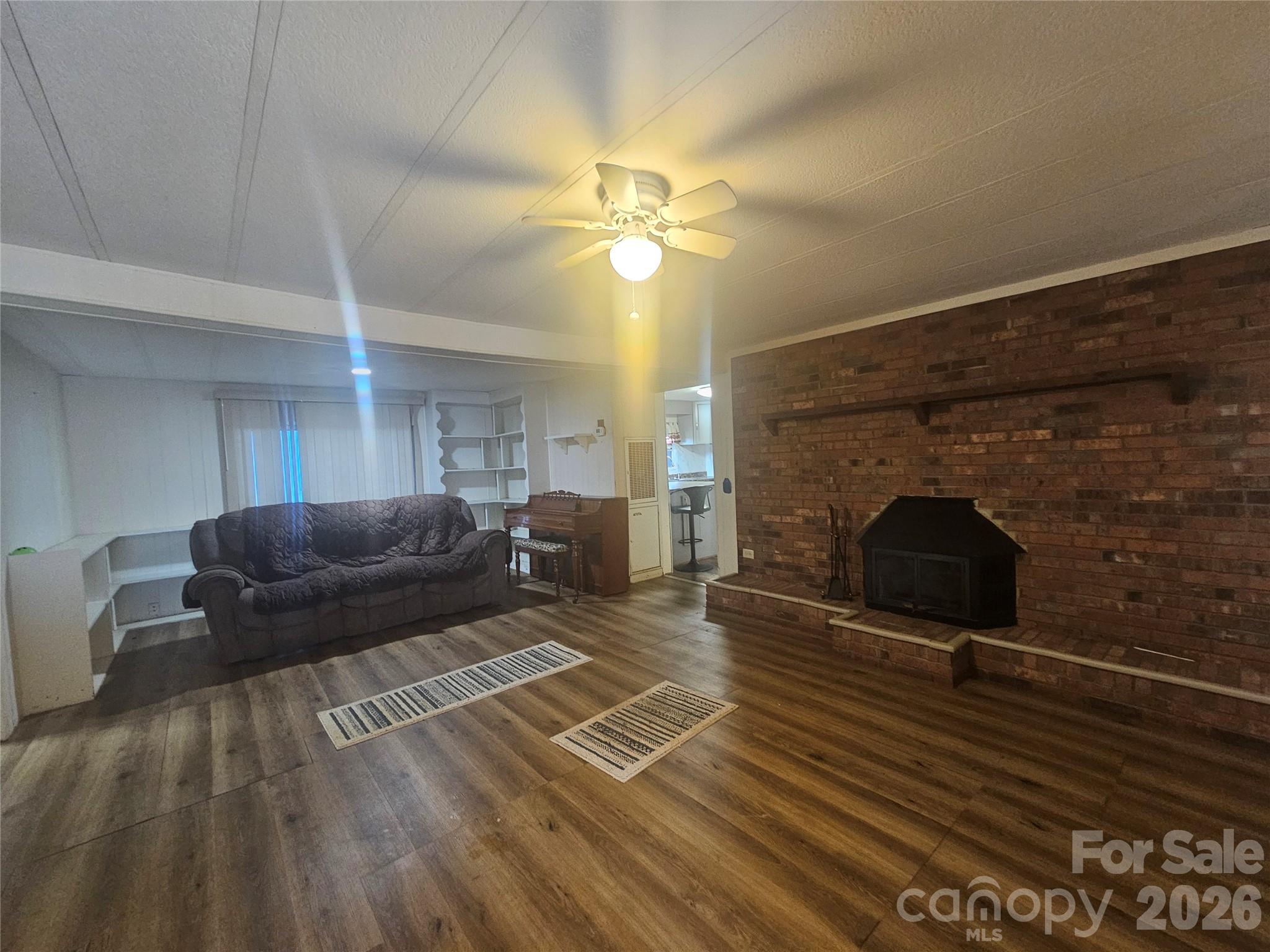 130 Susan Road Casar, NC 28020 - Photo 2 of 14 a living room with furniture and a fireplace