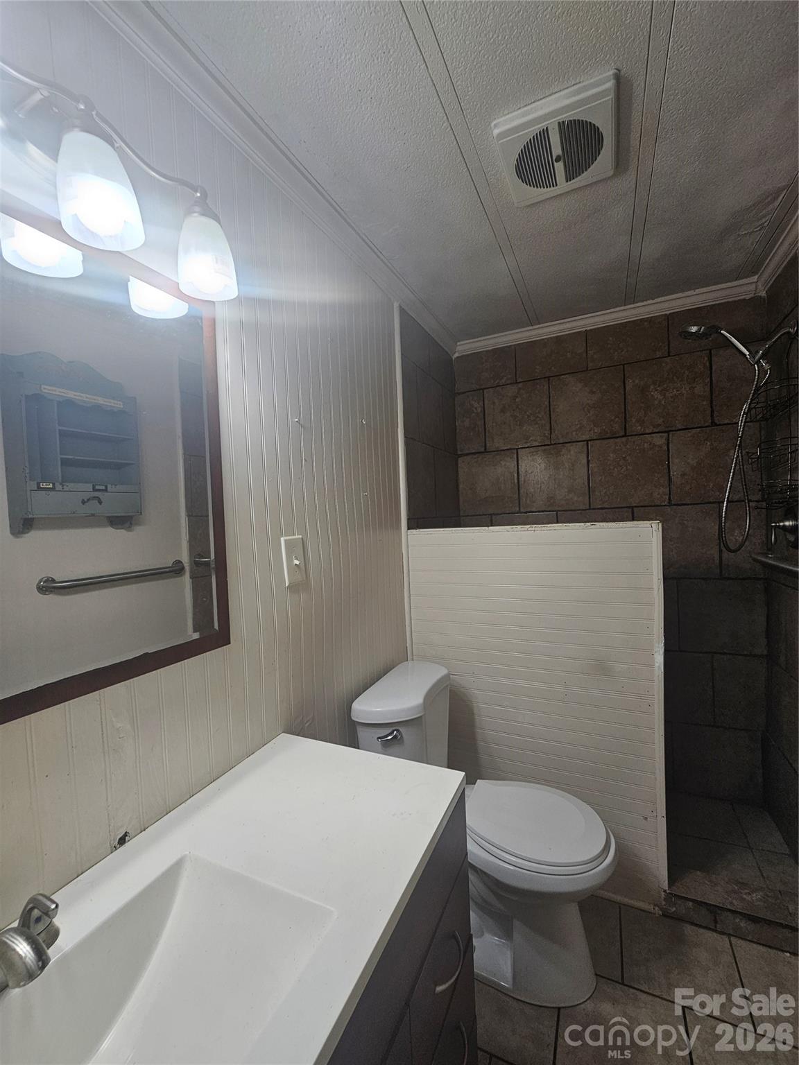 130 Susan Road Casar, NC 28020 - Photo 8 of 14 a bathroom with a toilet a sink and shower