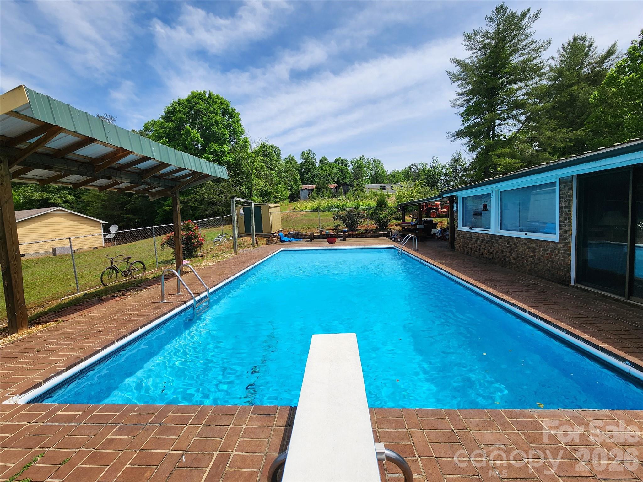 130 Susan Road Casar, NC 28020 - Photo 10 of 14 a view of a backyard with swimming pool