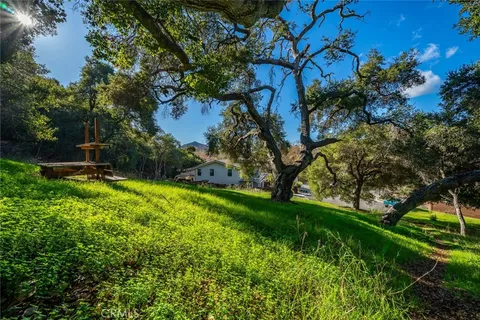 a view of an outdoor space and a yard