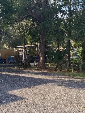 a view of a yard in front of a house