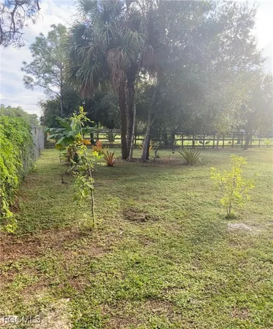 a view of a water with a yard