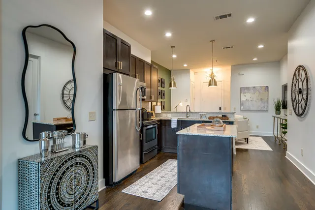 a very nice looking kitchen with a large window
