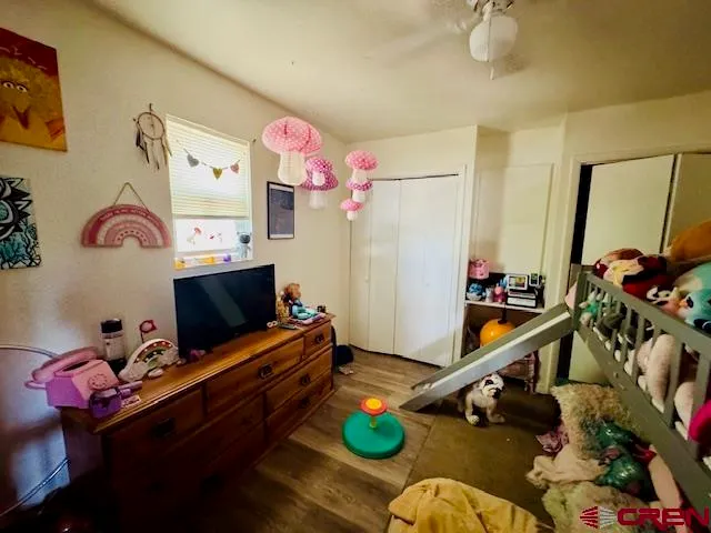 a room with furniture and a flat screen tv