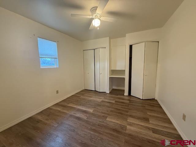 320 Southwest 8th Avenue Cedaredge, CO 81413 - Photo 12 of 18 an empty room with closet and a ceiling fan