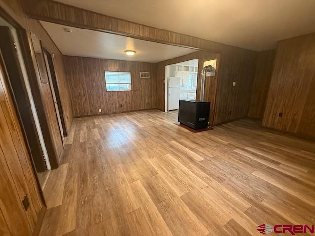320 Southwest 8th Avenue Cedaredge, CO 81413 - Photo 13 of 18 a view of an empty room with wooden floor and a window