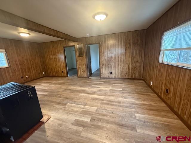 320 Southwest 8th Avenue Cedaredge, CO 81413 - Photo 14 of 18 an empty room with wooden floor and windows