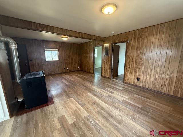 320 Southwest 8th Avenue Cedaredge, CO 81413 - Photo 15 of 18 an empty room with wooden floor and windows