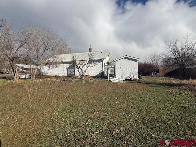 320 Southwest 8th Avenue Cedaredge, CO 81413 - Photo 2 of 18 a view of a house with a snow