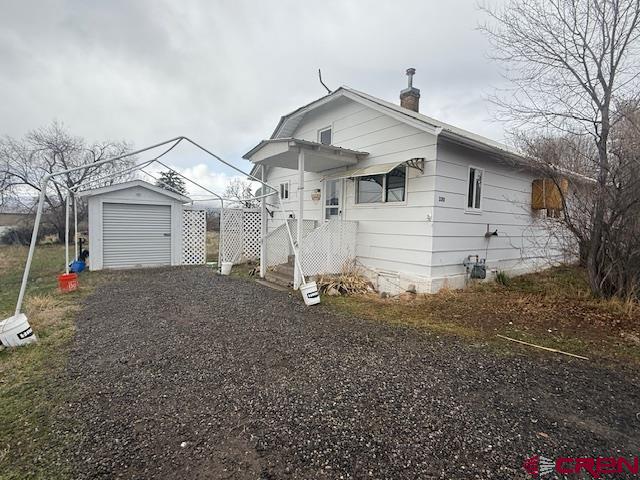 320 Southwest 8th Avenue Cedaredge, CO 81413 - Photo 5 of 18 a front view of a house with a yard