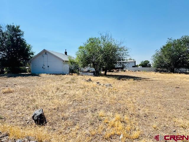 320 Southwest 8th Avenue Cedaredge, CO 81413 - Photo 6 of 18 a view of large house with a yard