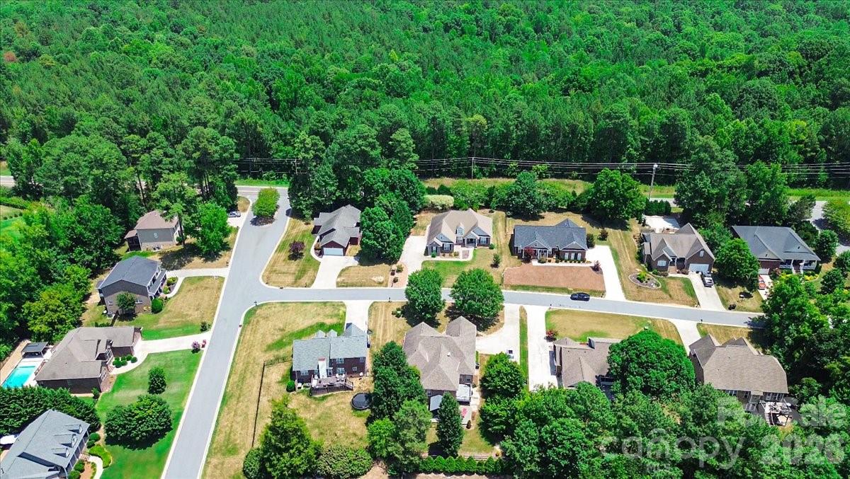 783 Sloan Street Denver, NC 28037 - Photo 41 of 44 an aerial view of residential house with outdoor space and swimming pool