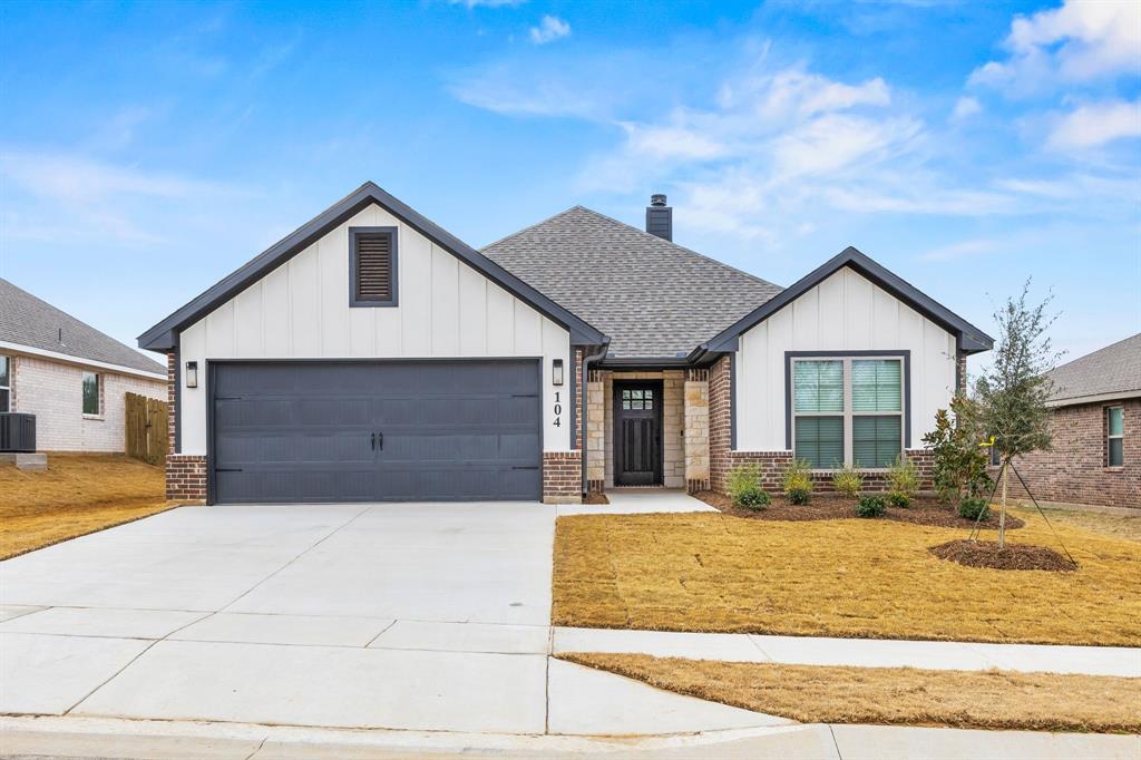 104 Maverick Trail Valley View, TX 76272 - Photo 3 of 30 a front view of a house with a yard