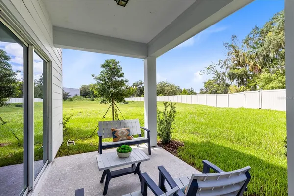 a building outdoor space with patio furniture