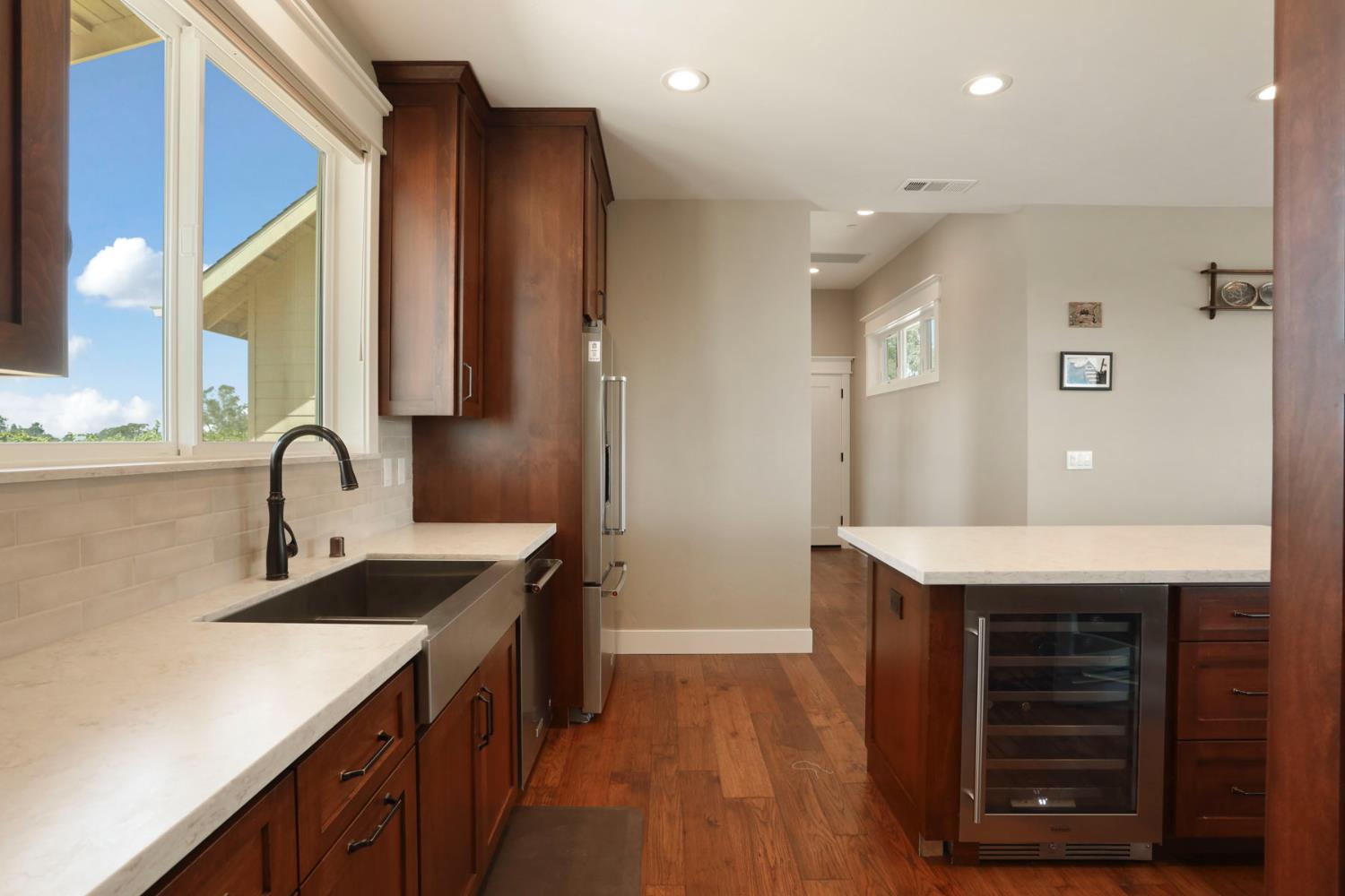 18739 Clements Road Lodi, CA 95240 - Photo 11 of 39 a kitchen with a sink and cabinets