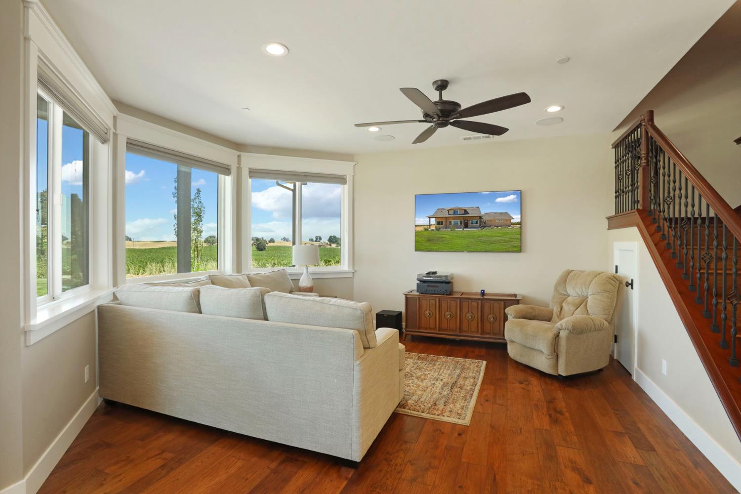 18739 Clements Road Lodi, CA 95240 - Photo 14 of 39 a living room with furniture and a large window