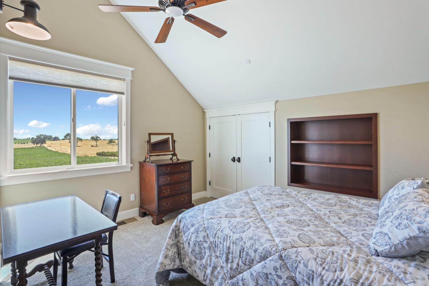 18739 Clements Road Lodi, CA 95240 - Photo 23 of 39 a bedroom with a bed and a desk
