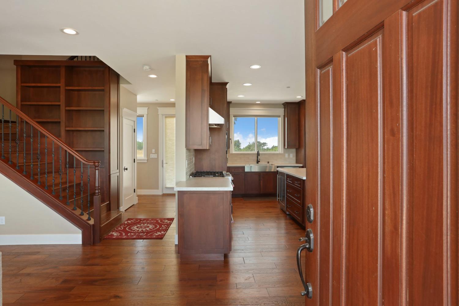 18739 Clements Road Lodi, CA 95240 - Photo 9 of 39 a view of a kitchen with cabinets and wooden floor