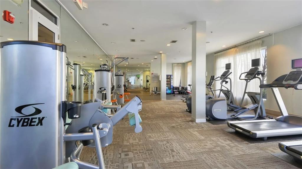 2115 Piedmont Road Northeast, Unit 4206 Atlanta, GA 30324 - Photo 12 of 14 a view of a room with gym equipment