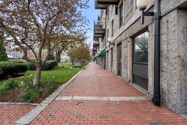 a view of a pathway both side of yard
