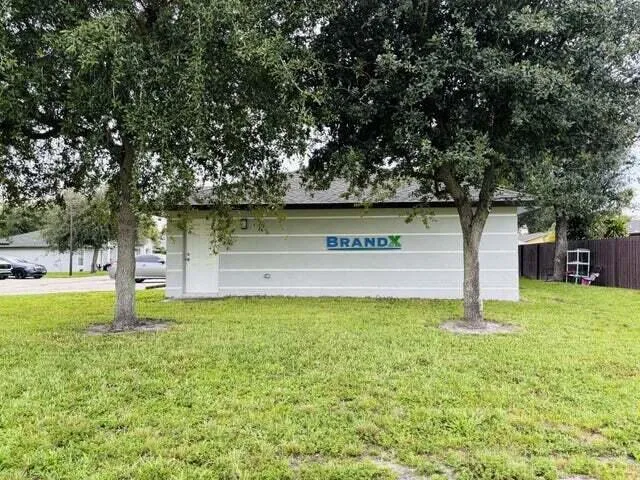 a view of a park with swings and slides