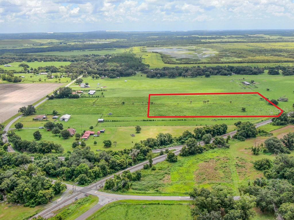 2 Allen Road Lithia, FL 33547 - Photo 3 of 13 a view of a field with an ocean
