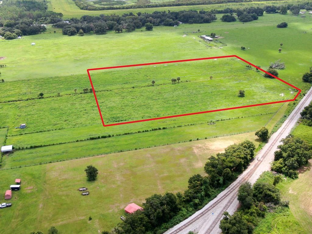 2 Allen Road Lithia, FL 33547 - Photo 6 of 13 a view of a garden with a lake