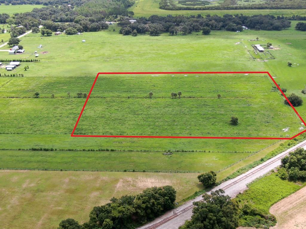 2 Allen Road Lithia, FL 33547 - Photo 7 of 13 a view of a golf ground with huge green field and plants