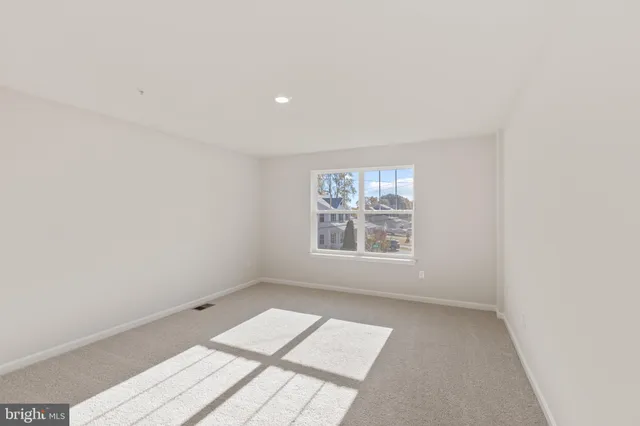 a view of a room with a window