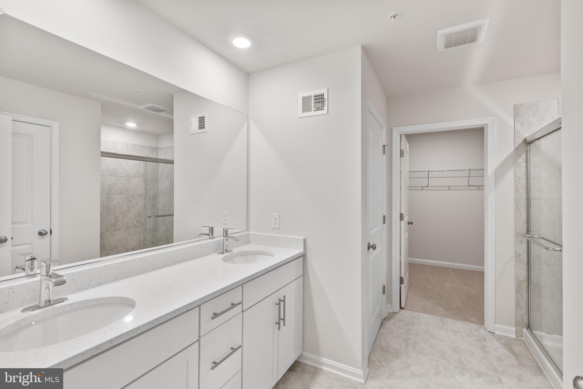 3704 Devonann Lane Edgewater, MD 21037 - Photo 21 of 32 a bathroom with a sink and a mirror