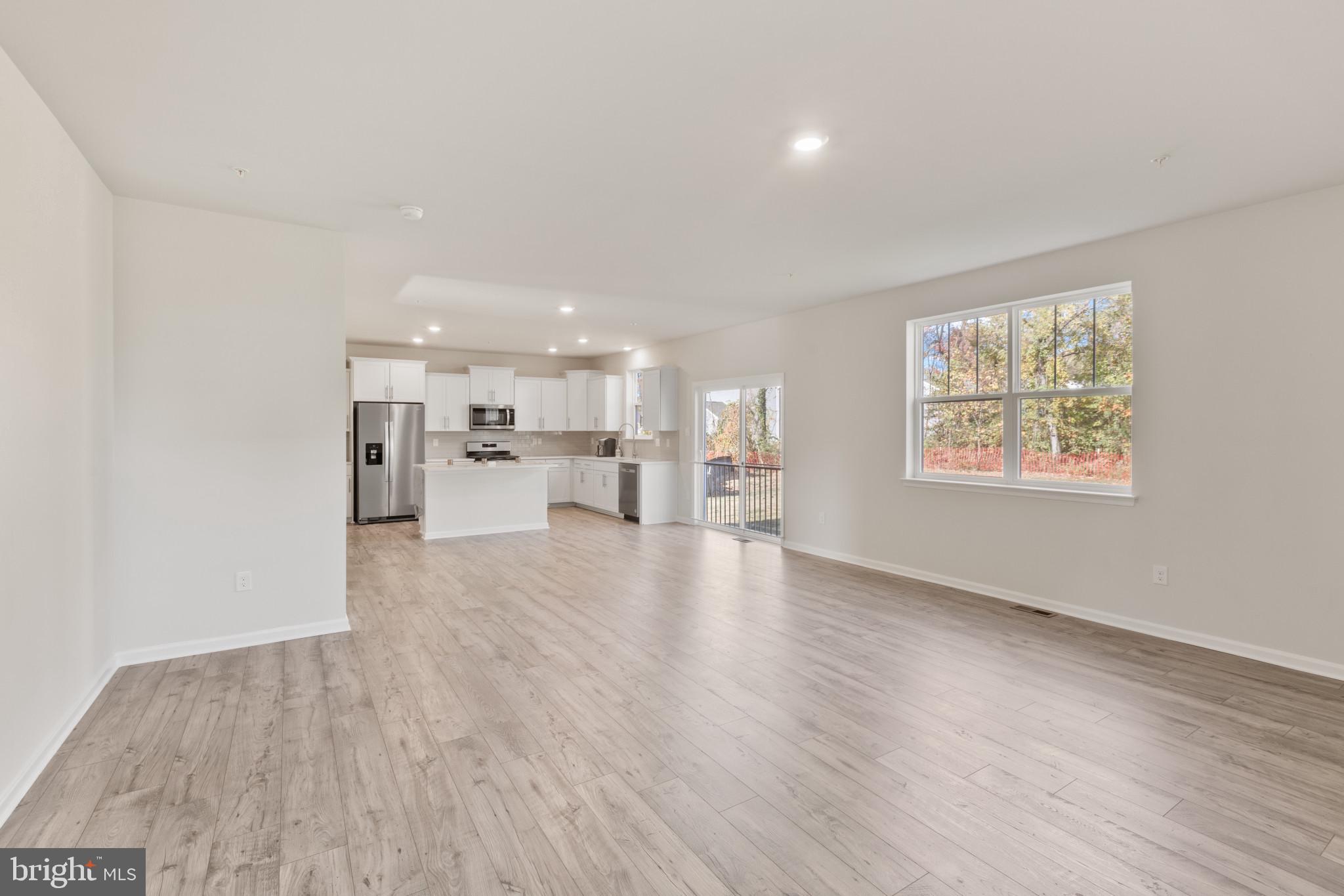 3704 Devonann Lane Edgewater, MD 21037 - Photo 9 of 32 a view of kitchen with furniture and wooden floor