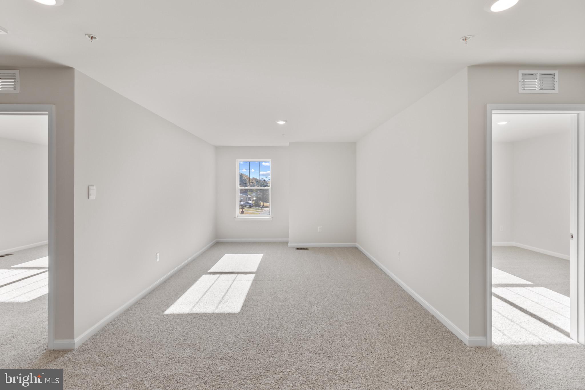 3704 Devonann Lane Edgewater, MD 21037 - Photo 10 of 32 an empty room with windows