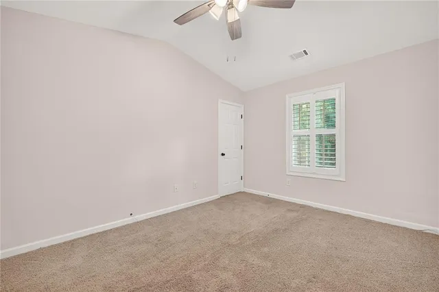 a view of a kitchen with furniture and a kitchen