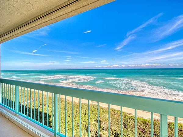 a view of an ocean from a balcony