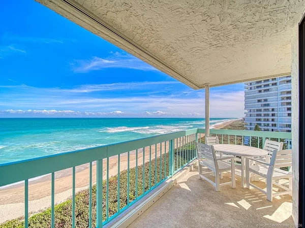a view of a chairs and table on the terrace