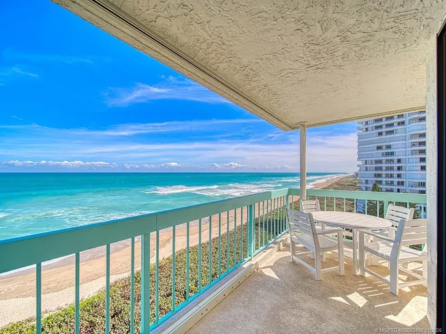 a view of a chairs and table on the terrace