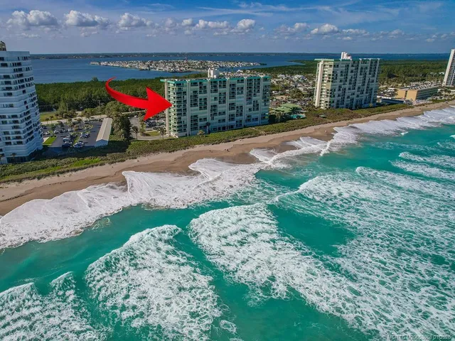 a view of a bench in front of a building