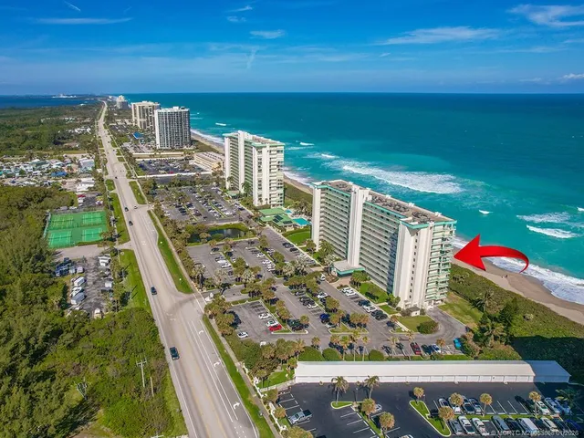 a view of city with ocean
