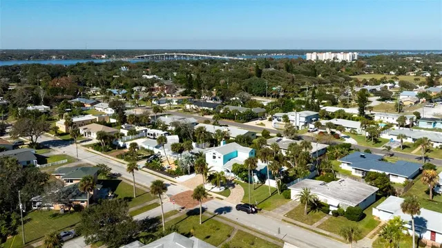 a view of a house with backyard porch and patio