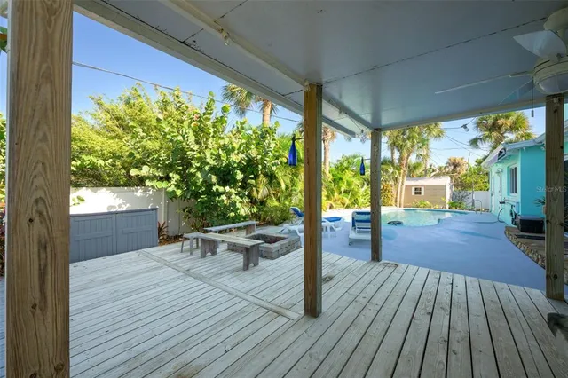 a backyard of a house with seating space