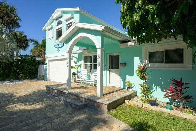 a kitchen with stainless steel appliances granite countertop a refrigerator and a stove