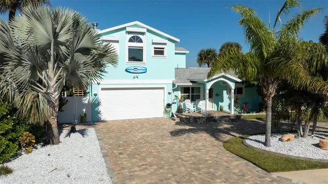 a kitchen with stainless steel appliances granite countertop a sink and a stove