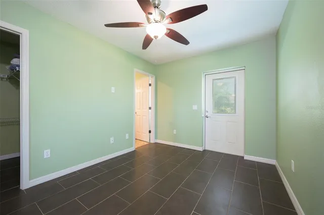 a bath tub sitting next to a window