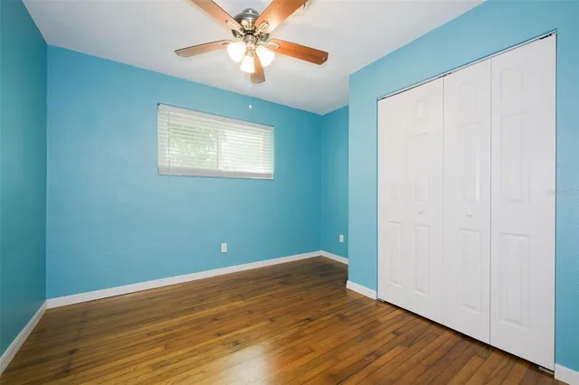 a bathroom with a double vanity sink mirror and toilet