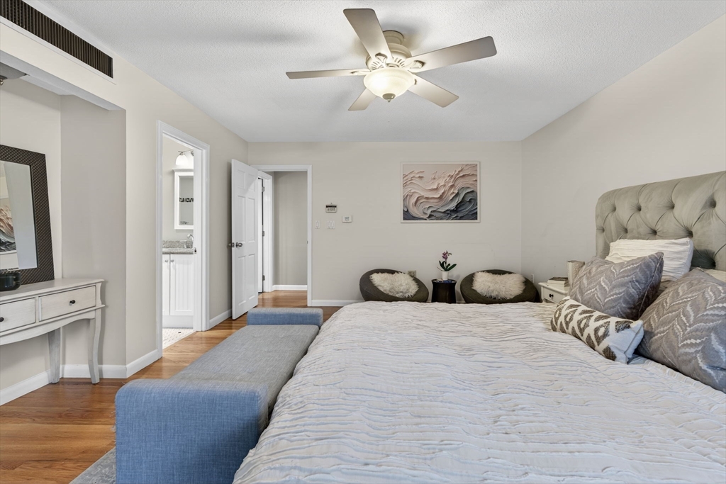 17 Karlton Circle Andover, MA 01810 - Photo 11 of 18 a bedroom with a large bed and a couch