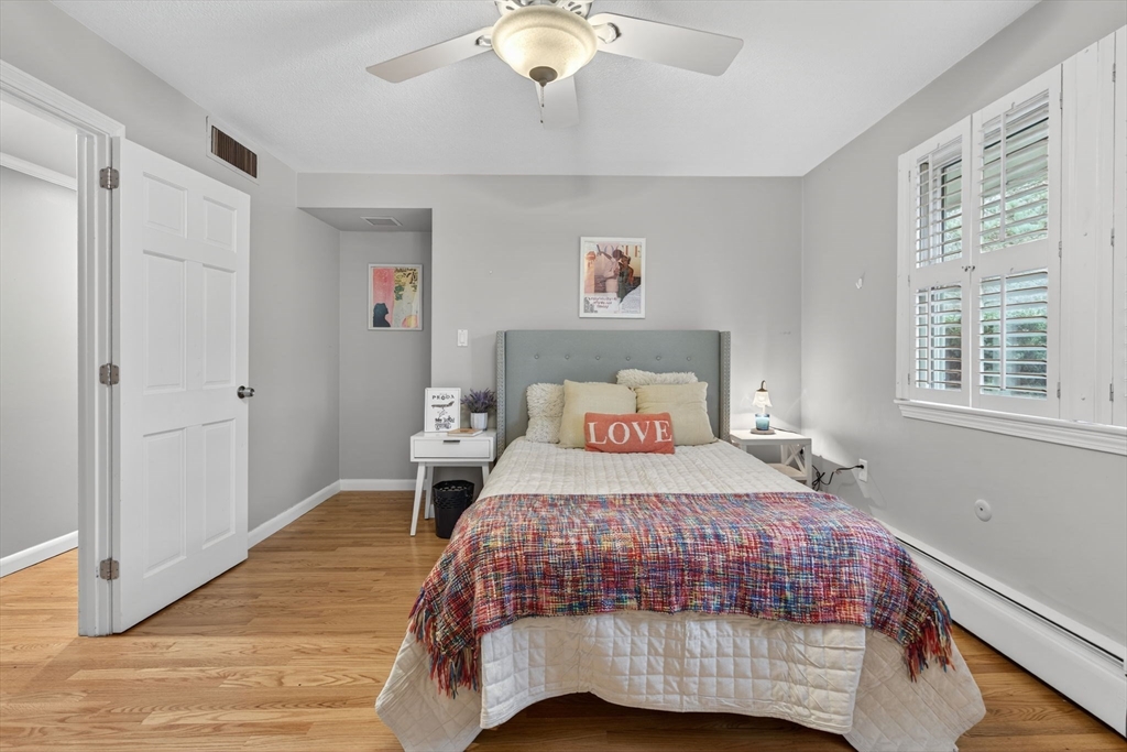 17 Karlton Circle Andover, MA 01810 - Photo 14 of 18 a bedroom with a bed and a window